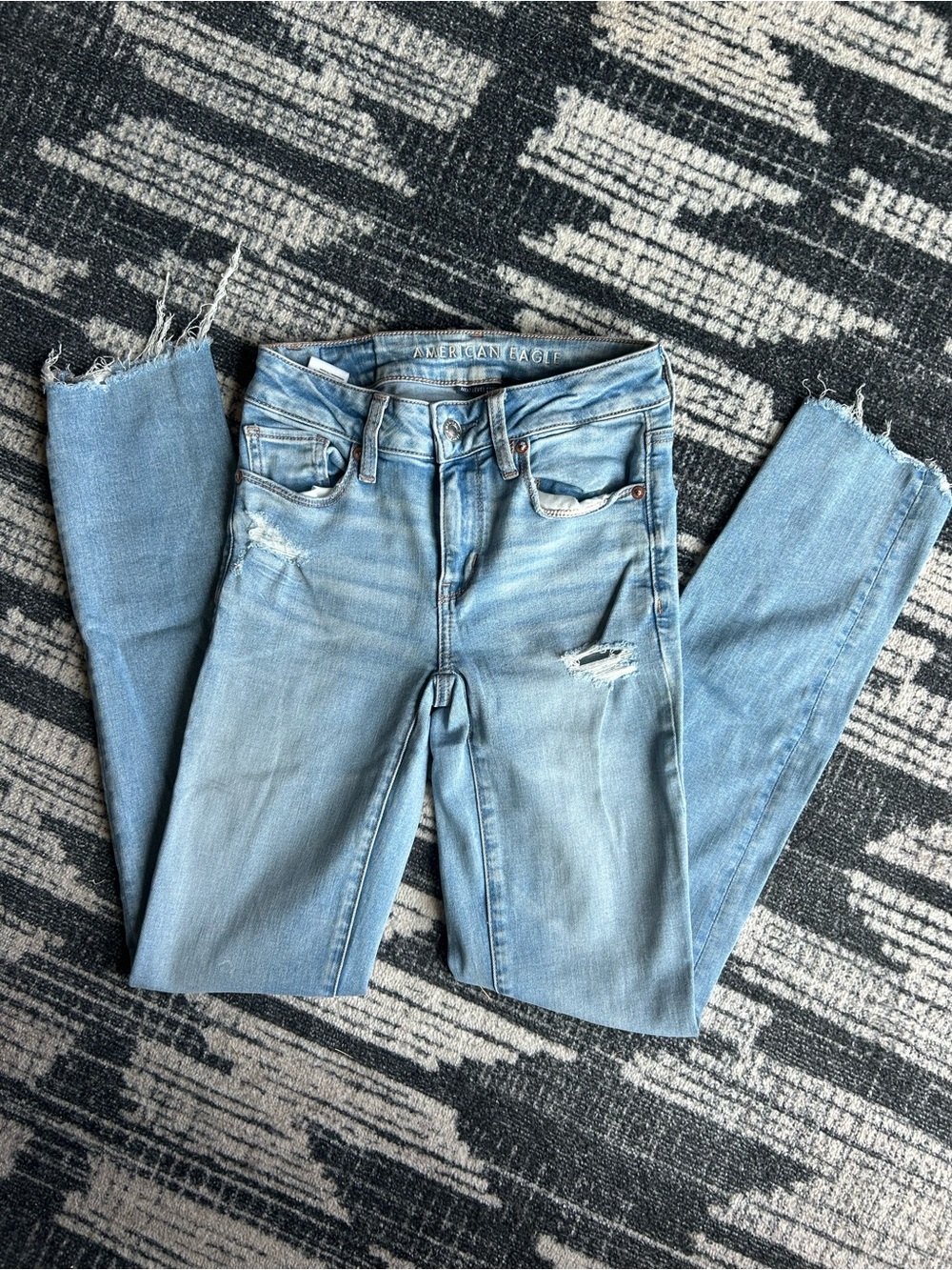 American Eagle Outfitters Light Wash Skinny Jeans with Distressed Details